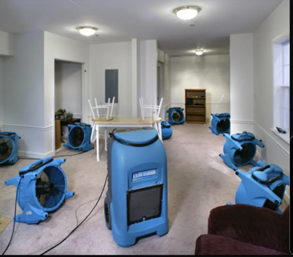 Air movers and dehumidifier setup for Water Damage Restoration in Fairview